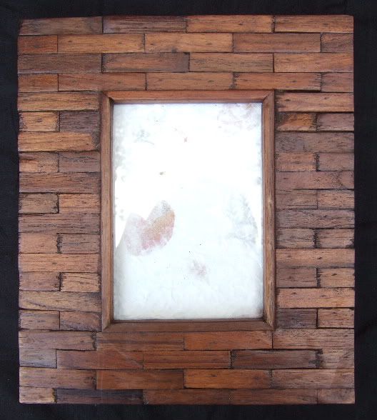 Rustic teak picture frame from angle.