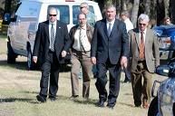 [Hillsborough sheriff's Col. Albert Frost, from left, Sam Cardinale from the Polk State Attorneys Office, Hillsborough State Attorney Mark Ober and Polk State Attorney Jerry Hill are at the scene in Plant City on Tuesday.]